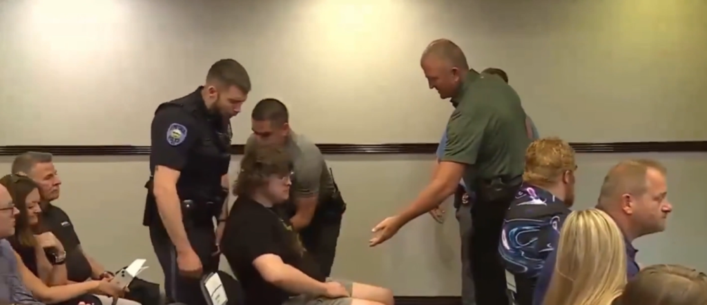 TYRANNY: US Citizen Arrested for Clapping at a Data Center Meeting